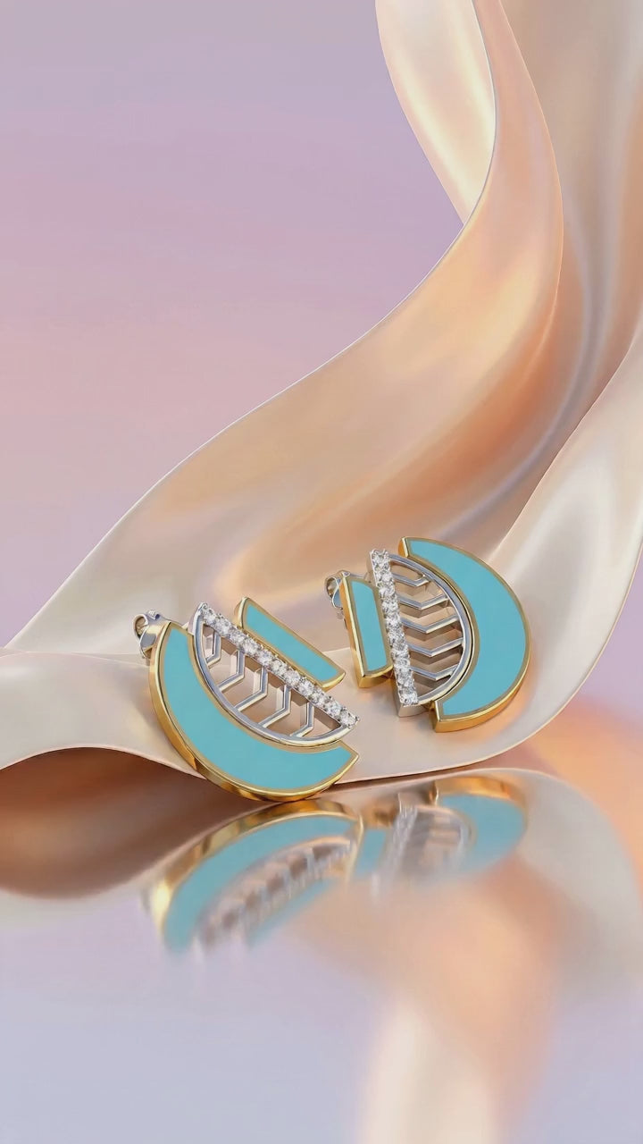 Amara Harmony earrings in 18k yellow and white gold, in motion