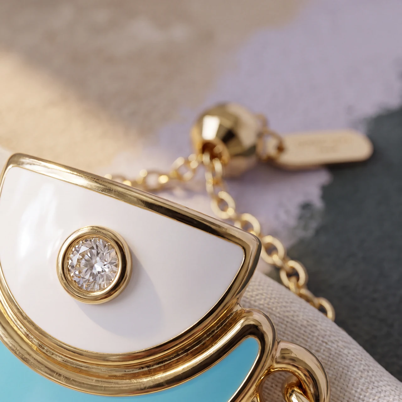 The Amara enamel meeting the gold, close up